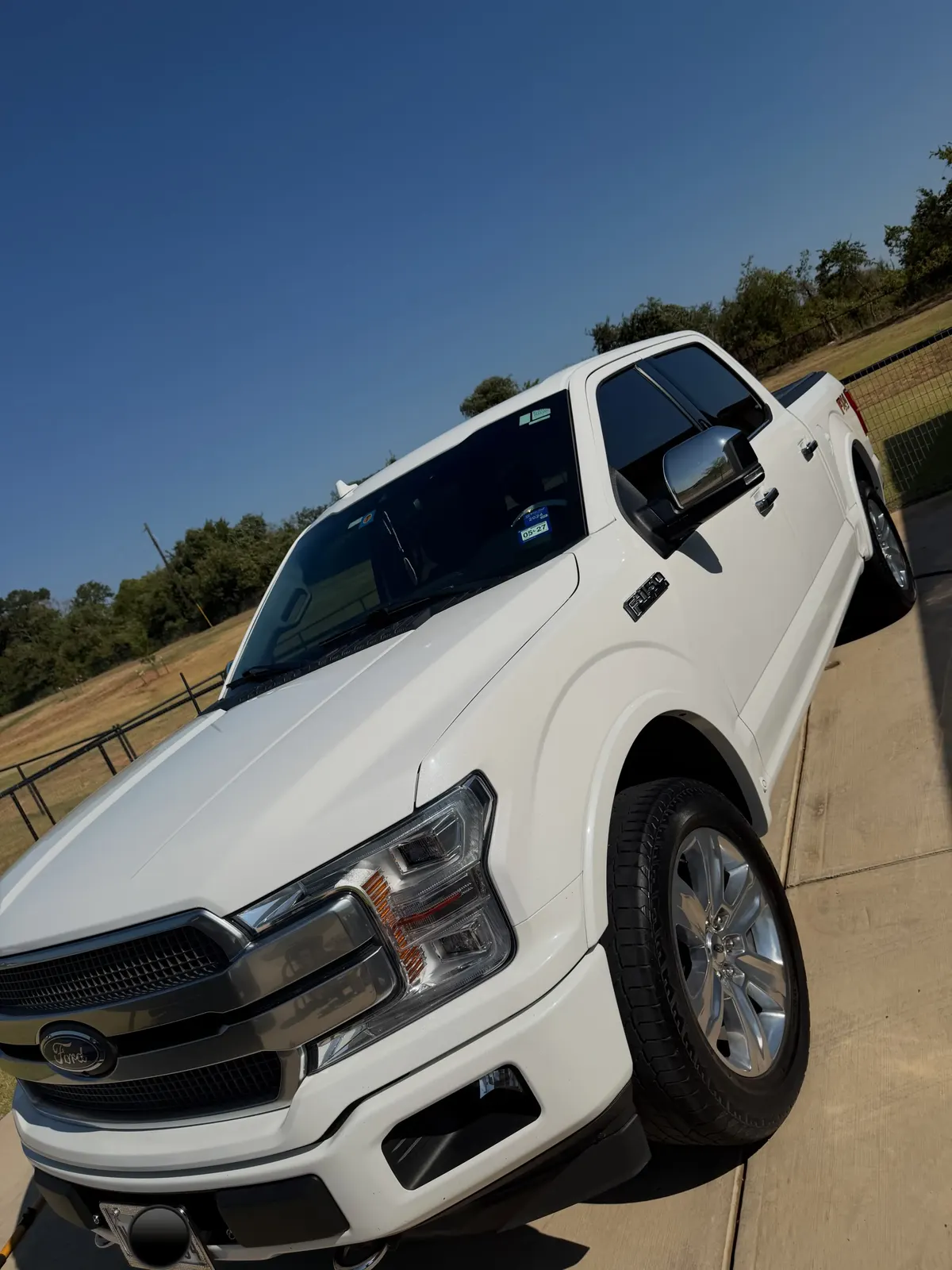 White Ford F-150 detailed on location in DFW