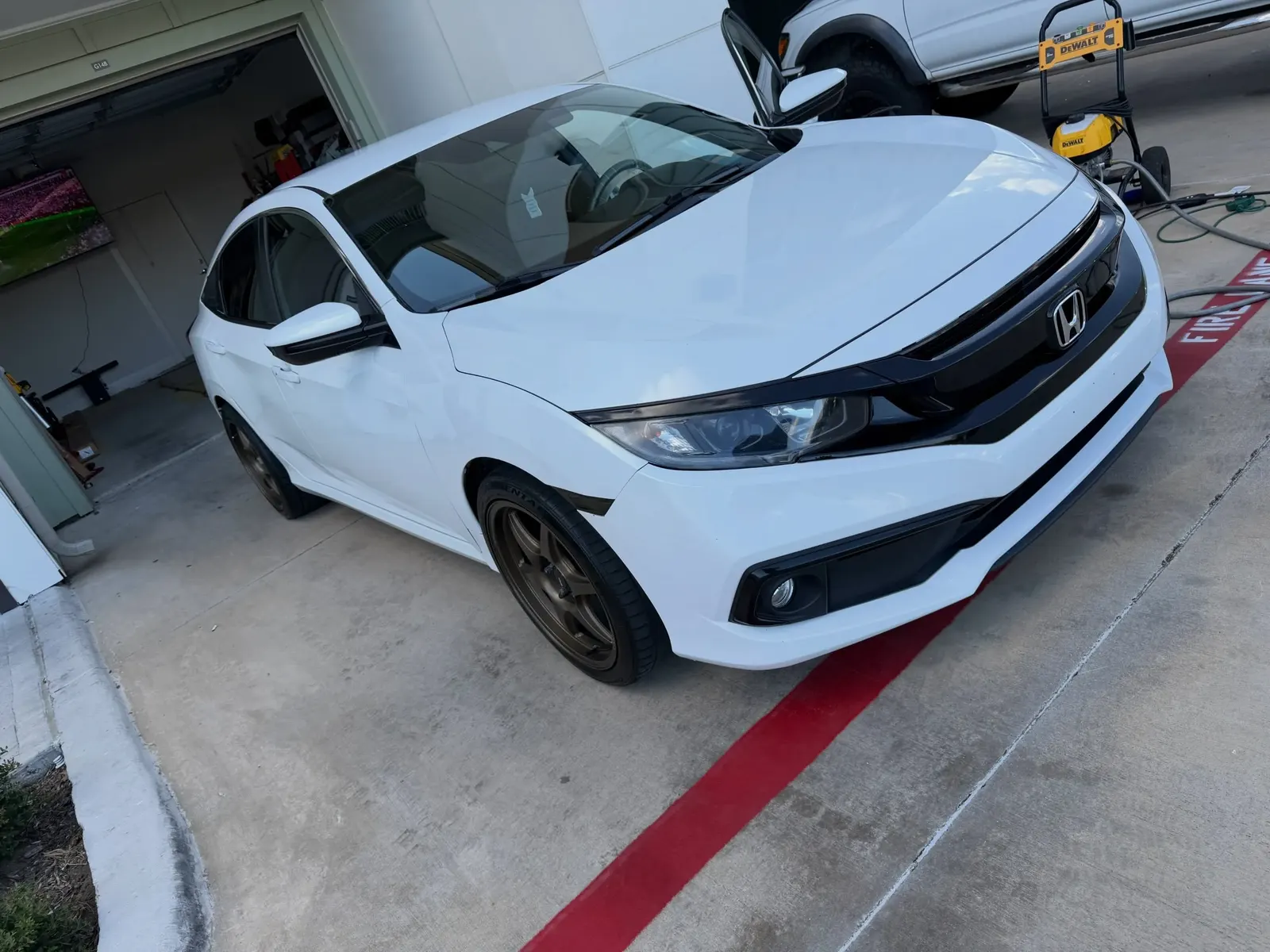 White Honda Civic detailed and glossy