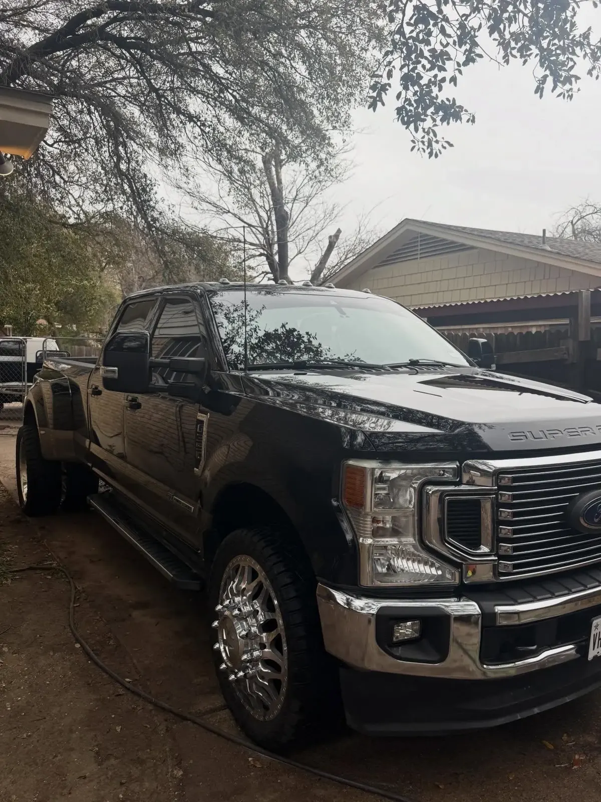 Black dually truck after a full exterior detail